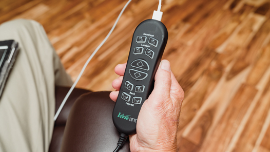 Remote Control with USB Port charging a phone